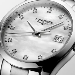 Longines Conquest Classic 34mm L2.386.4.87.6 | Dame Dameure Med Lænke | Dameure I Stål