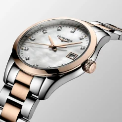 Longines Conquest Classic 34mm L2.386.3.87.7 | Dame Dameure Med Lænke | Dameure I Bicolor