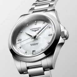 Longines Conquest 34mm L3.430.4.87.6 | Dame Dameure I Stål | Dameure Med Lænke