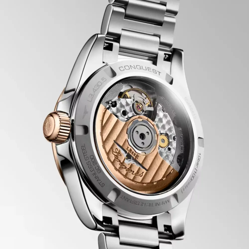 Longines Conquest 34mm L3.430.5.92.6 | Dame Dameure Med Lænke | Dameure I Bicolor